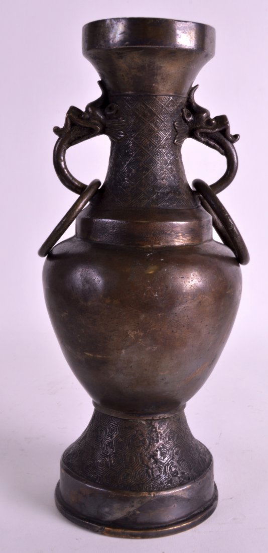 A CHINESE LATE YUAN/MING BRONZE TWIN HANDLED ALTAR VASE (1 of 2)