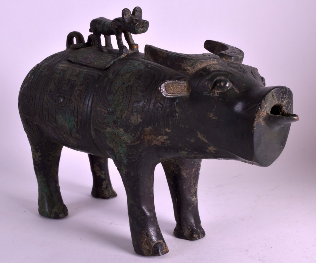 A CHINESE WARRING STATES STYLE CENSER AND COVER in the (1 of 4)