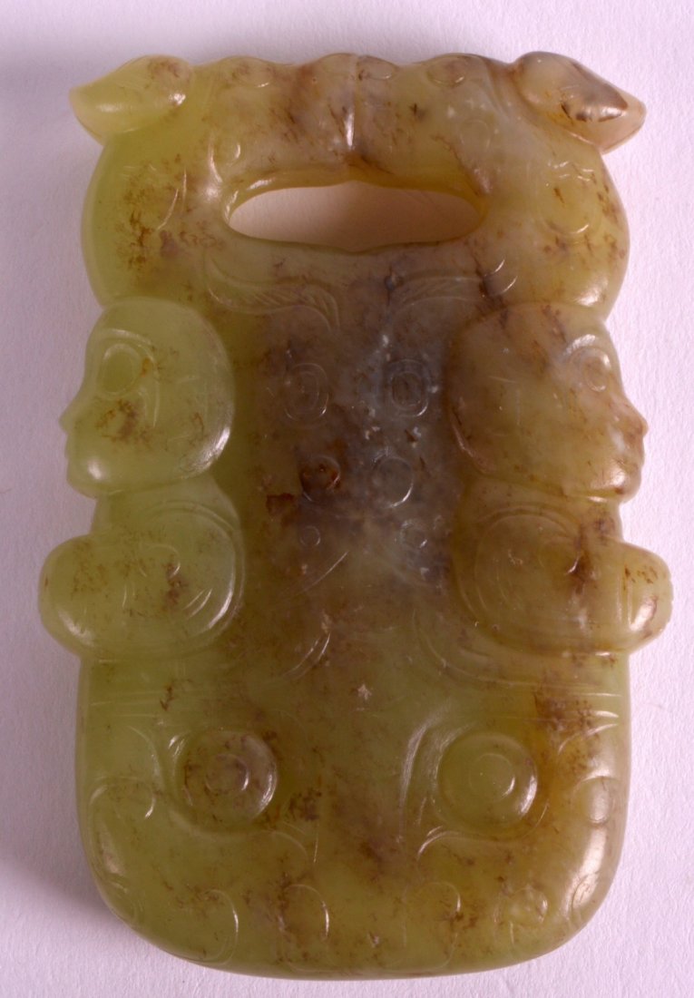 A CHINESE CARVED GREEN JADE ARCHAIC TYPE PLAQUE incised (1 of 2)