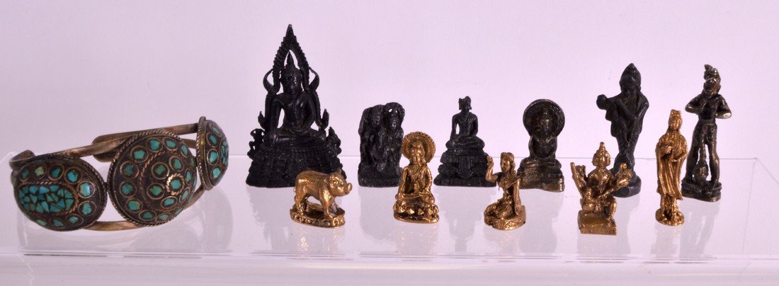 A COLLECTION OF CHINESE AND TIBETAN MINIATURE BUDDHAS (1 of 2)