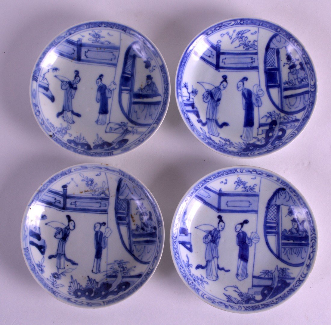 A SET OF FOUR 18TH CENTURY CHINESE CA MAU CARGO SAUCERS: A SET OF FOUR 18TH CENTURY CHINESE CA MAU CARGO SAUCERS painted with two figures before a male peering from a window. 4.25ins diameter. (4)
