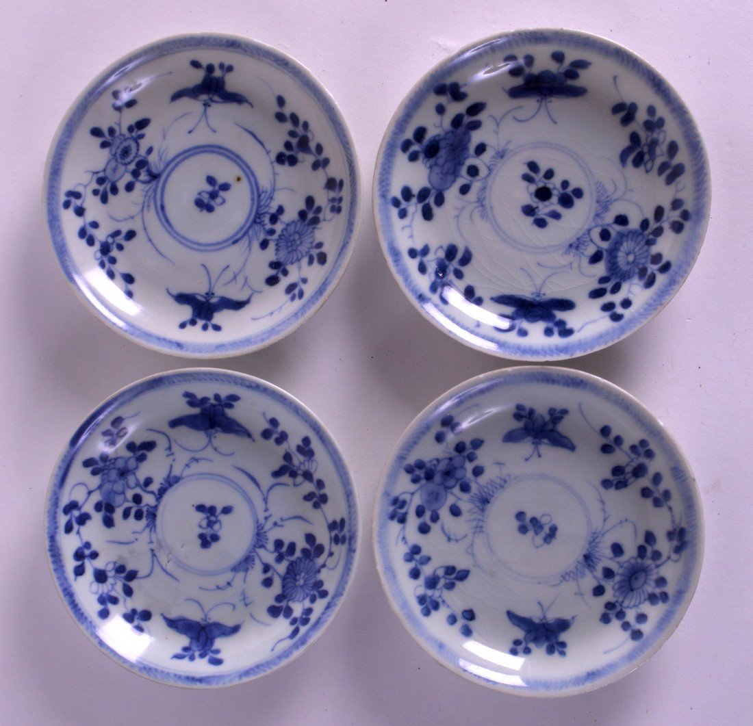 A SET OF FOUR 18TH CENTURY CHINESE CA MAU CARGO SAUCERS: A SET OF FOUR 18TH CENTURY CHINESE CA MAU CARGO SAUCERS painted with floral sprays. 4.75ins diameter. (4)