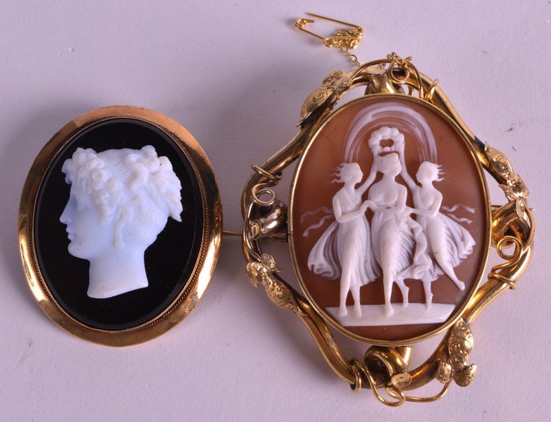A VICTORIAN CARVED CAMEO BROOCH depicting the three (1 of 1)