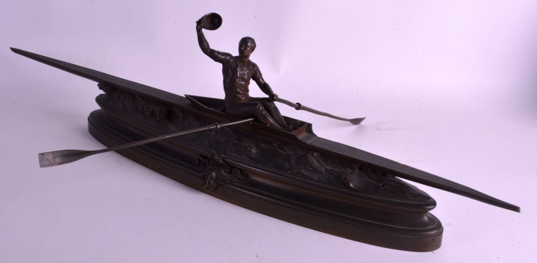 Pierre Eugene Emile Herbert (1828-1893) Le Champion,: Pierre Eugene Emile Herbert (1828-1893) Le Champion, depicting a male upon a rowing boat supported on an oval base. 2Ft 7ins long.