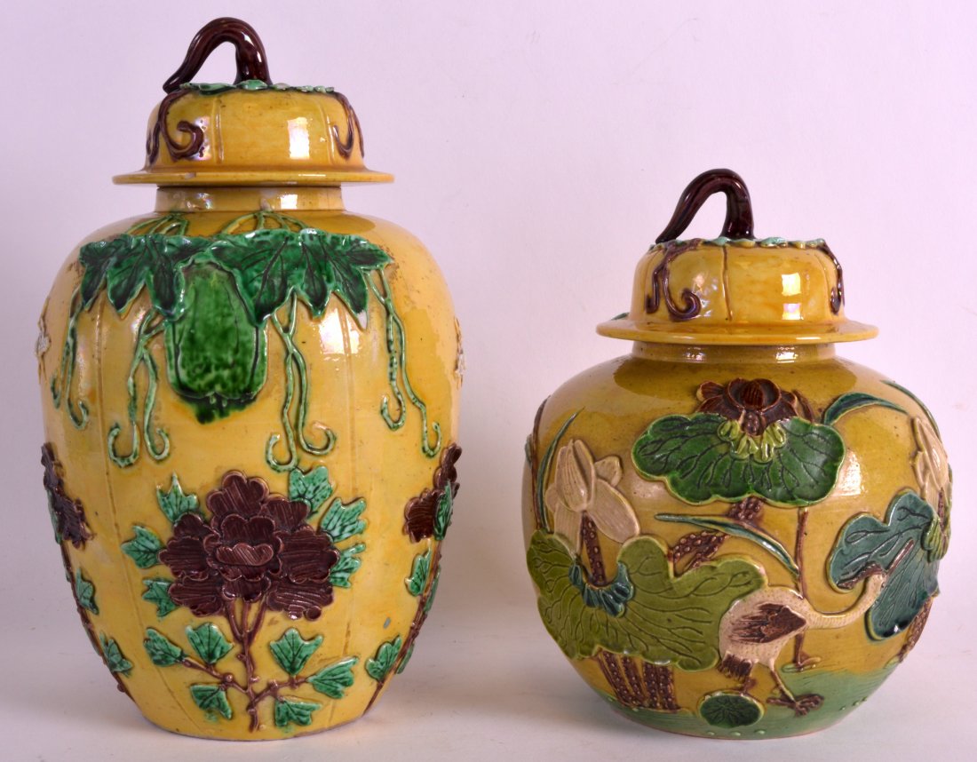 A LATE 19TH CENTURY CHINESE SANCAI TYPE GLAZED JAR AND: A LATE 19TH CENTURY CHINESE SANCAI TYPE GLAZED JAR AND COVER in the manner of Wang Bing Rong, together with a similar jar. 9.5ins & 7.5ins high. (2)