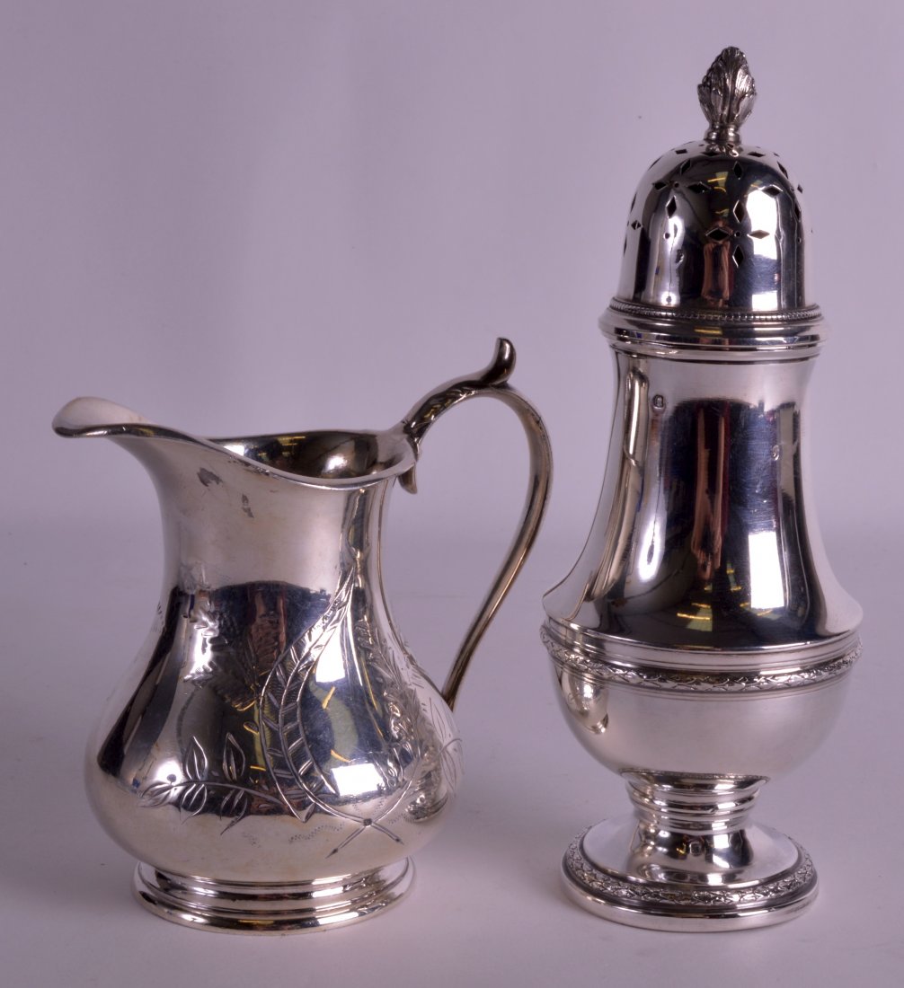 A CONTINENTAL SILVER SUGAR SIFTER together with a white (1 of 1)