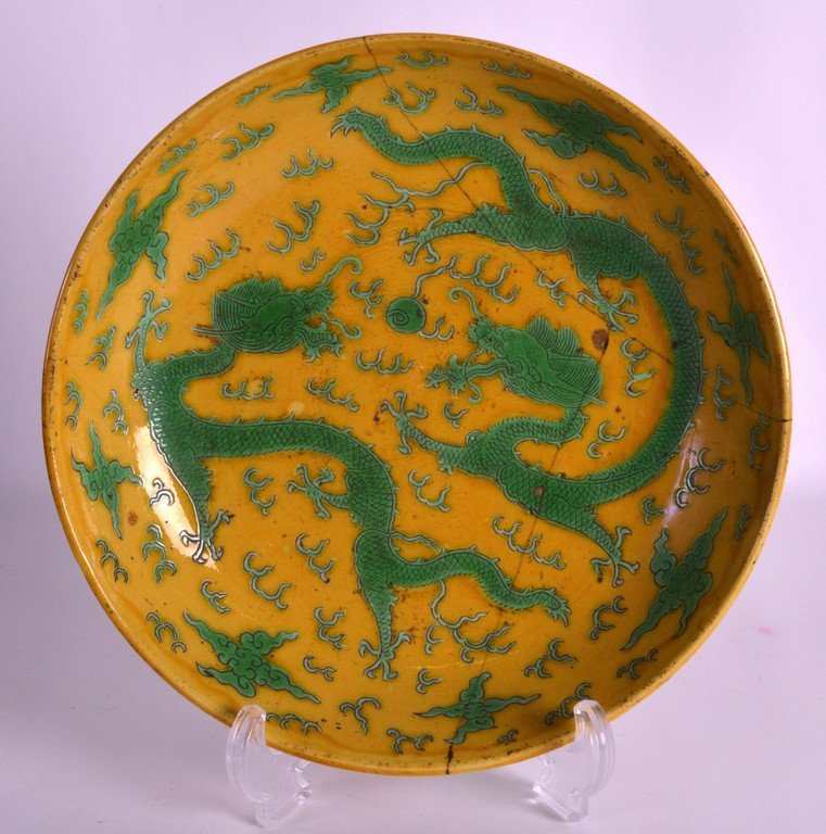 A LATE 19TH CENTURY CHINESE YELLOW GLAZED CIRCULAR (1 of 2)