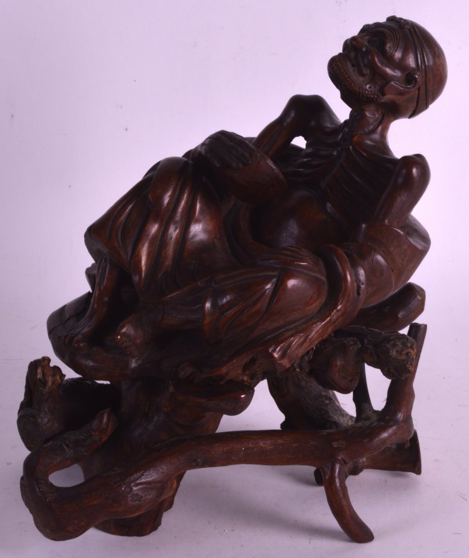A 19TH CENTURY CHINESE CARVED ROOTWOOD FIGURE OF A (1 of 1)