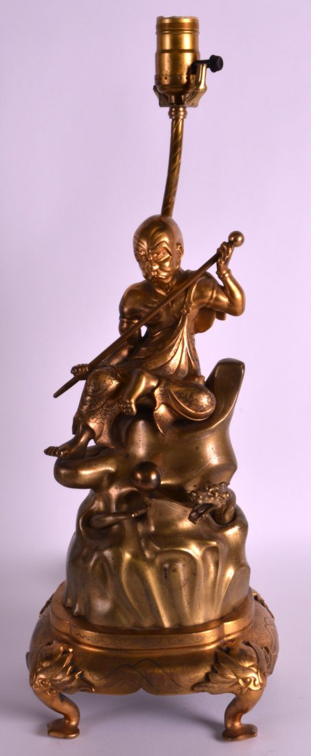 A 19TH CENTURY SILVER INLAID CHINESE BRONZE LAMP of (1 of 2)