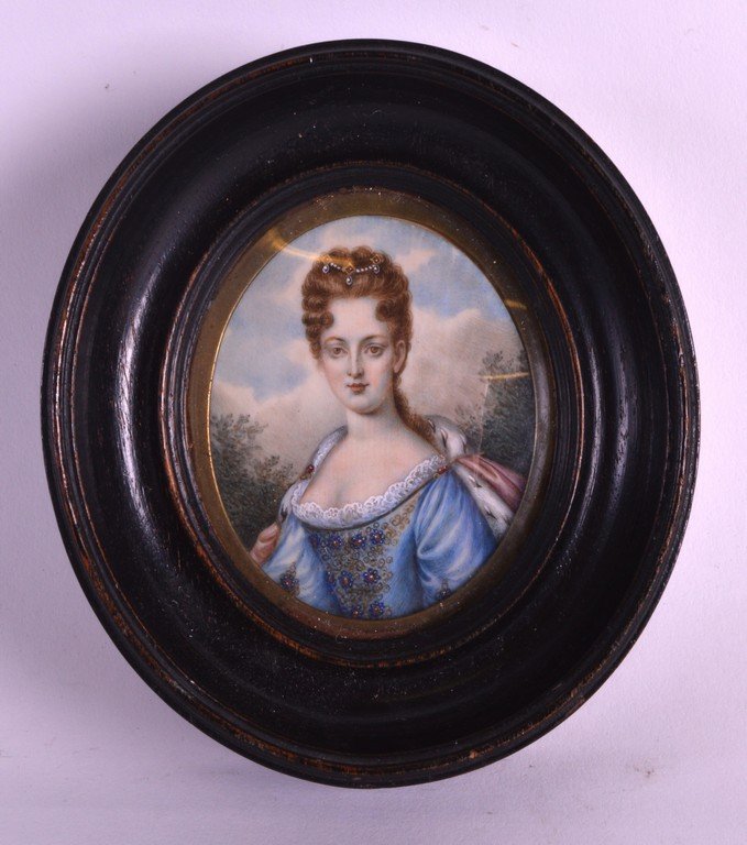 A 19TH CENTURY EUROPEAN IVORY MINIATURE depicting a: A 19TH CENTURY EUROPEAN IVORY MINIATURE depicting a female in blue robes. 2.25ins x 3.25ins.