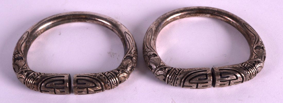 A PAIR OF EARLY 20TH CENTURY CHINESE SILVERED BRONZE (1 of 1)