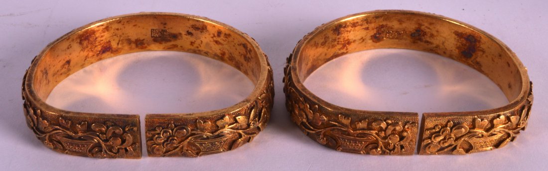 A PAIR OF EARLY 20TH CENTURY CHINESE BRONZE BANGLES (1 of 1)