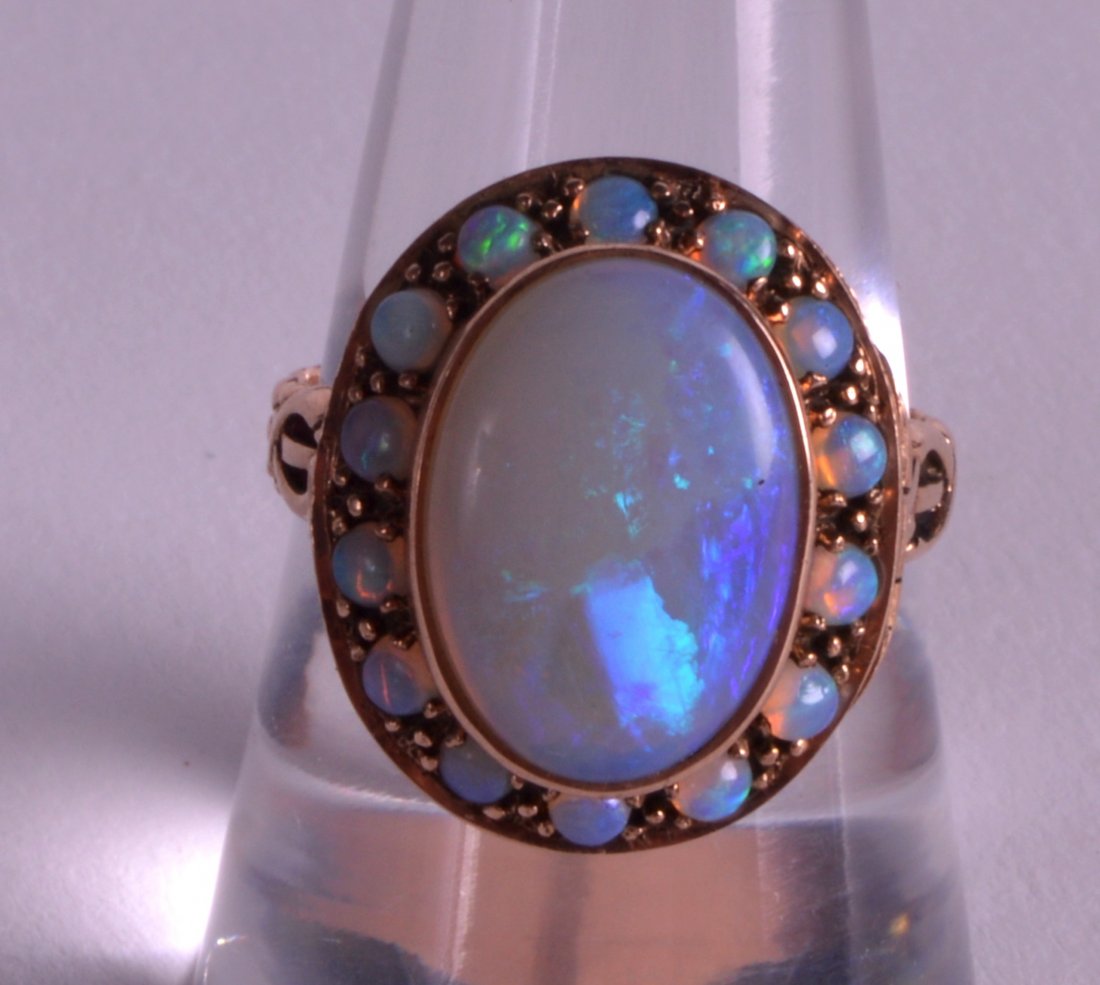 AN EDWARDIAN 9CT GOLD OPAL LOCKET/RING.: AN EDWARDIAN 9CT GOLD OPAL LOCKET/RING.