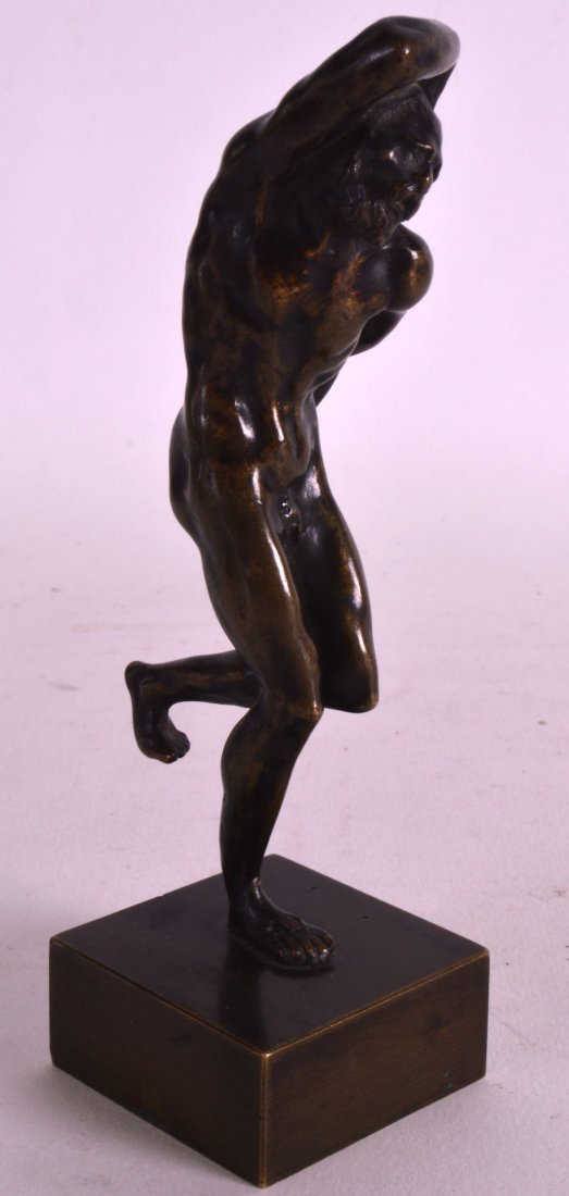 A 19TH CENTURY ITALIAN BRONZE FIGURE OF A NUDE MALE: A 19TH CENTURY ITALIAN BRONZE FIGURE OF A NUDE MALE modelled with one hand upon his head. 5.25ins high.