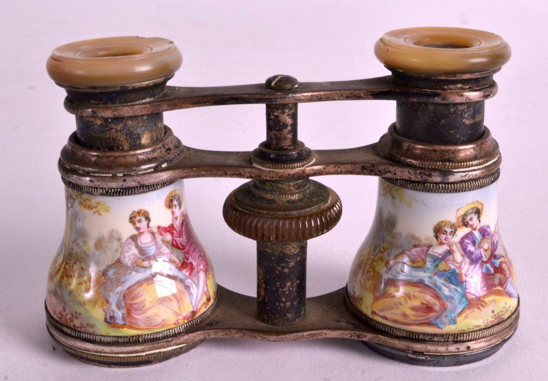 A PAIR OF LATE 19TH CENTURY SWISS ENAMEL OPERA GLASSES: A PAIR OF LATE 19TH CENTURY SWISS ENAMEL OPERA GLASSES painted with classical scenes. 4Ins wide.