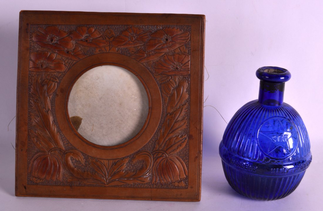 AN EARLY 20TH CENTURY ITALIAN POLKA WORK TYPE: AN EARLY 20TH CENTURY ITALIAN POLKA WORK TYPE PHOTOGRAPH FRAME together with a Hardens hand grenade fire extinguisher. (2)