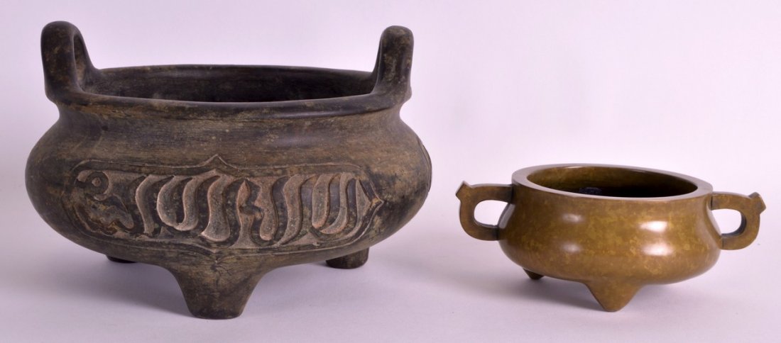 A LARGE CHINESE TWIN HANDLED BRONZE 'ISLAMIC MARKET': A LARGE CHINESE TWIN HANDLED BRONZE 'ISLAMIC MARKET' CENSER bearing Xuande marks to base, together with another censer. 7.5ins & 6ins wide. (2)