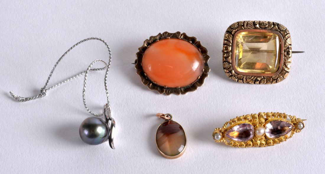 A GROUP OF THREE ANTIQUE YELLOW METAL BROOCHES together (1 of 1)