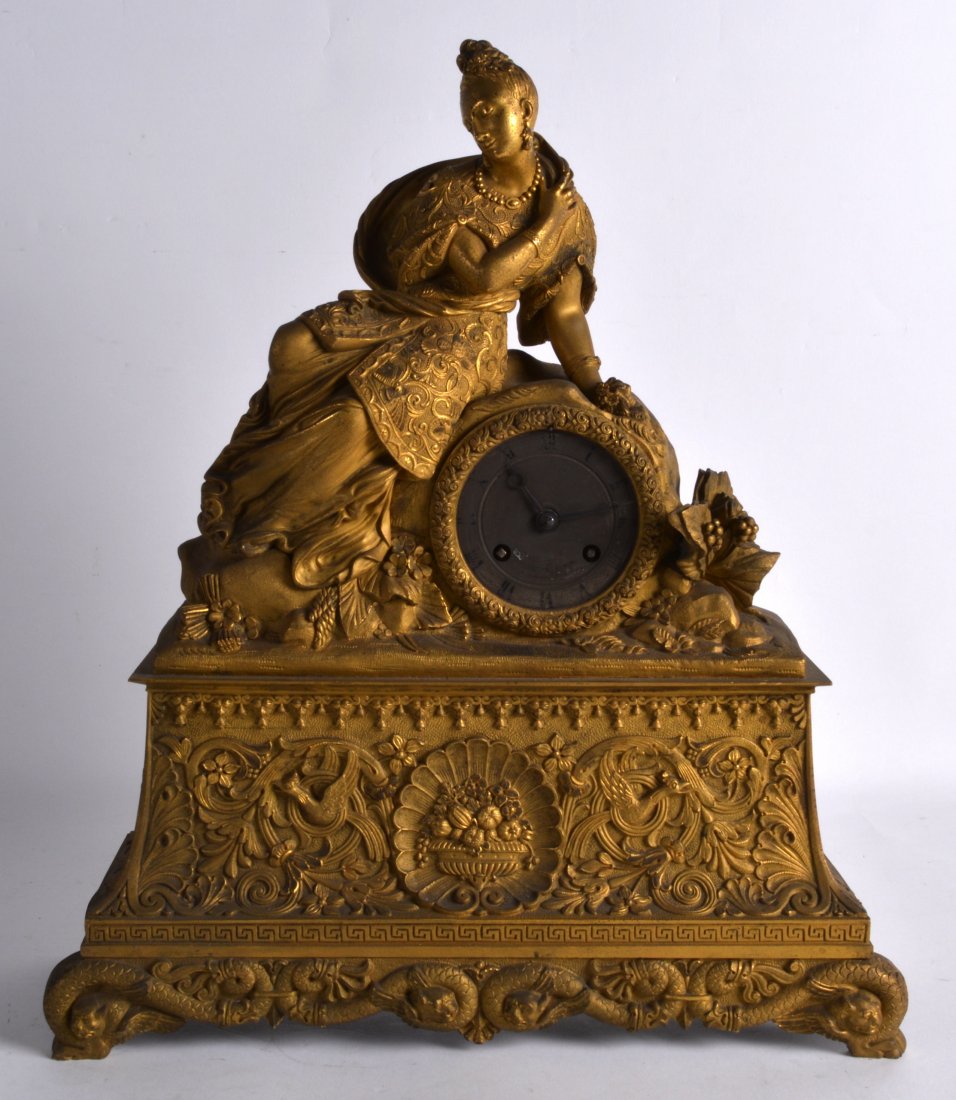 A LATE 19TH CENTURY FRENCH ORMOLU MANTEL CLOCK in the (1 of 2)