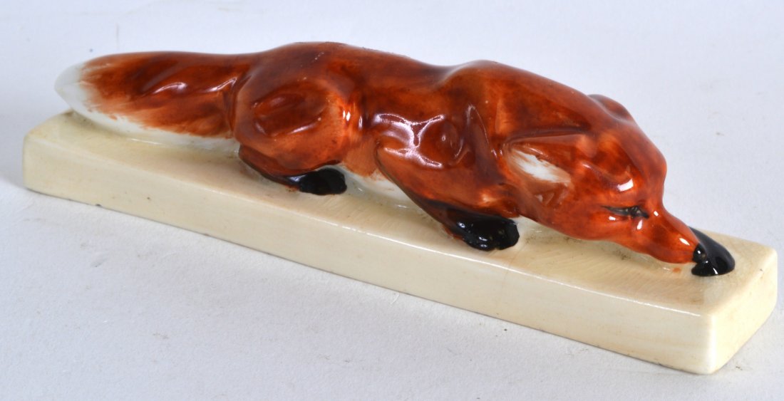 A ROYAL WORCESTER FIGURE OF A FOX C1932 modelled by: A ROYAL WORCESTER FIGURE OF A FOX C1932 modelled by Doris Lindner. 5.5ins wide.