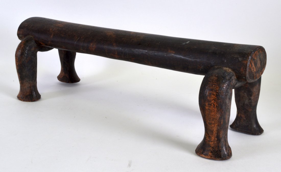 AN UNUSUAL EARLY 20TH CENTURY CARVED AFRICAN HEAD REST (1 of 1)