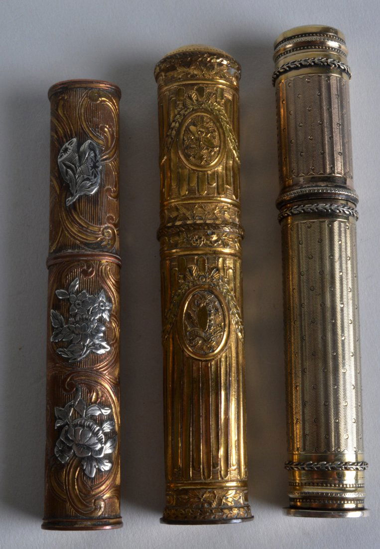 A LOVELY SET OF SIX 19TH CENTURY FRENCH SILVER AND: A LOVELY SET OF SIX 19TH CENTURY FRENCH SILVER AND YELLOW METAL NEEDLE CASES decorated with flowers. 5.25ins long. (3)