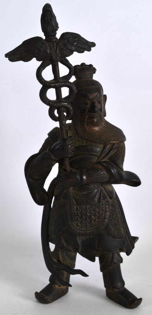 A 17TH CENTURY CHINESE BRONZE FIGURE OF A WARRIOR Ming, (1 of 2)