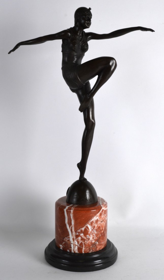 A MODERN BRONZE STUDY OF A FLAPPER GIRL upon a marble: A MODERN BRONZE STUDY OF A FLAPPER GIRL upon a marble base. 1Ft 9ins high.