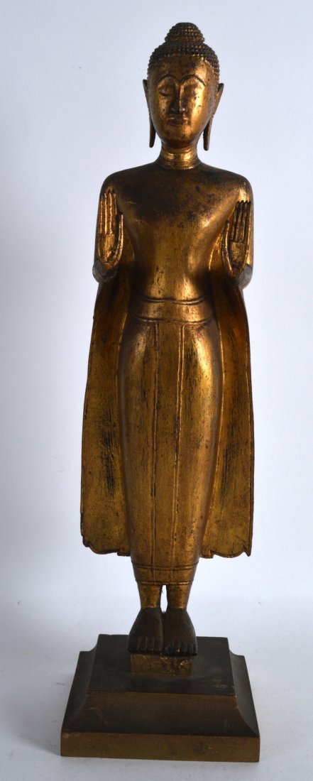 A LOVELY 19TH CENTURY THAI GILTWOOD FIGURE OF (1 of 2)