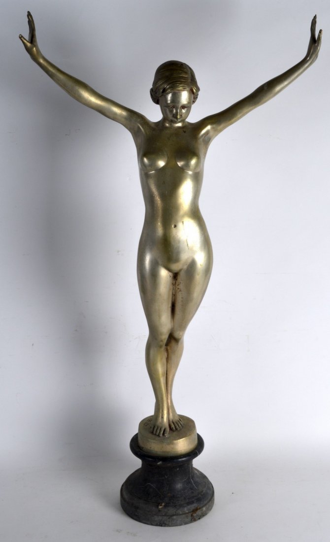 A LARGE ART DECO CHROME FIGURE OF A STANDING NUDE: A LARGE ART DECO CHROME FIGURE OF A STANDING NUDE FEMALE after a model by Ferdinand Preiss, upon a marble base. 2Ft 10ins high.
