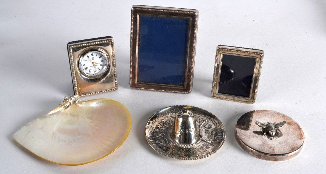 A SMALL ENGLISH HALLMARKED SILVER CLOCK together with a (1 of 1)