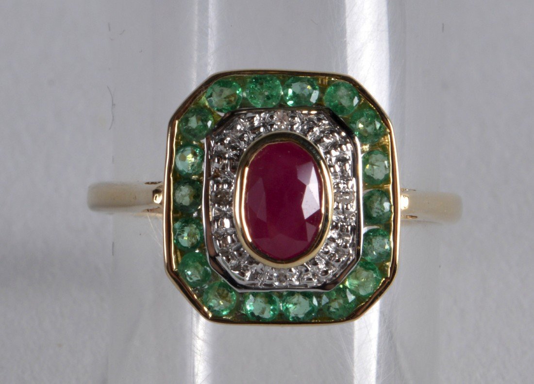 A 9CT EMERALD RUBY AND DIAMOND RING. (1 of 2)