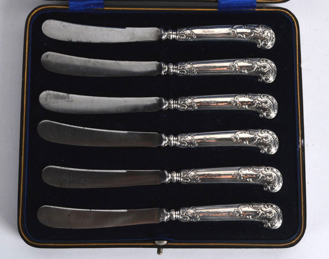 A CASED SET OF SIX ENGLISH SILVER HALLMARKED BUTTER (1 of 1)