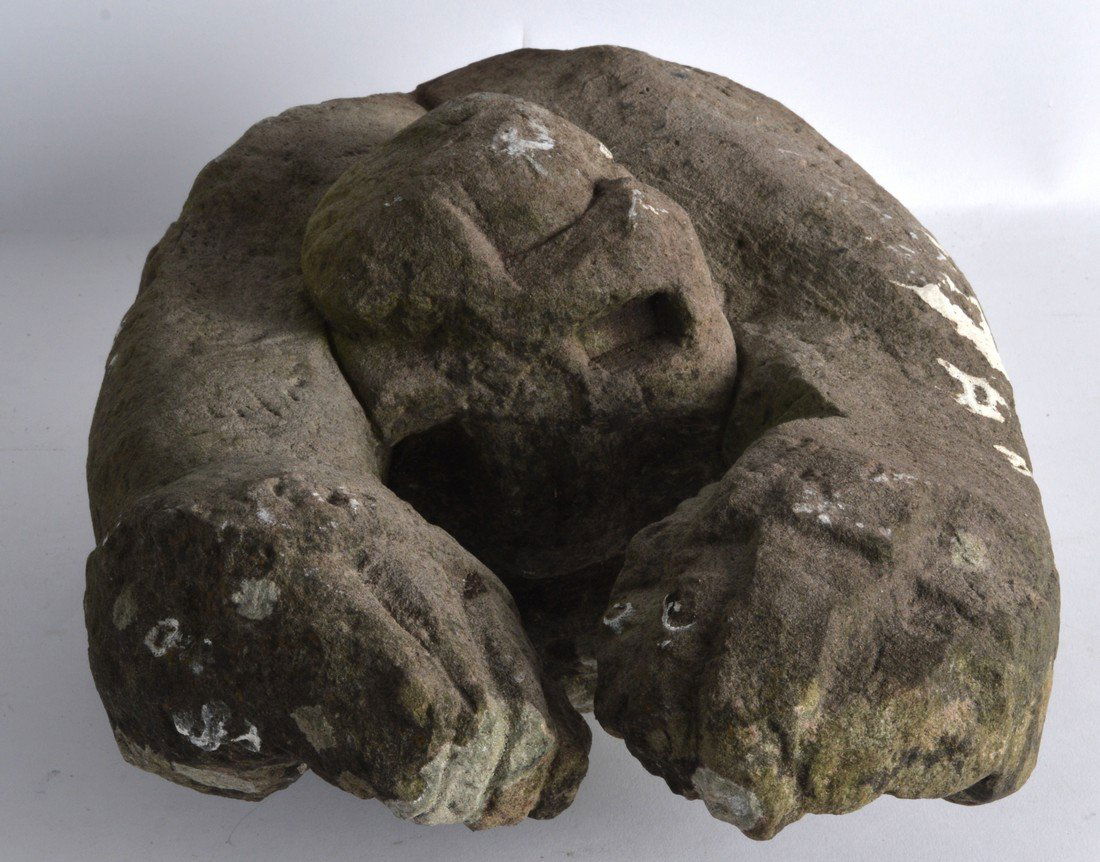 AN EARLY CARVED STONE GARGOYLE TYPE FIGURE modelled (1 of 1)