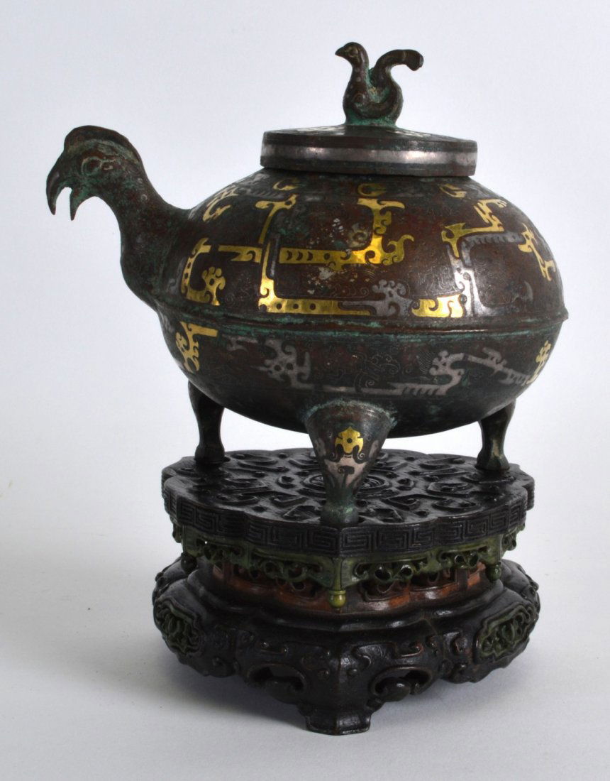 A GOOD CHINESE BRONZE AND GILT OVERLAID CENSER AND (1 of 4)