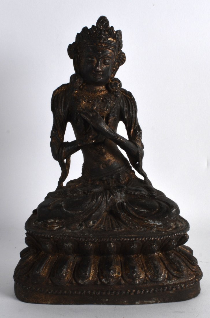 A 19TH CENTURY CHINESE BRONZE FIGURE OF AMITAYUS: A 19TH CENTURY CHINESE BRONZE FIGURE OF AMITAYUS modelled with hands crossed upon a triangular base. 9.25ins high.