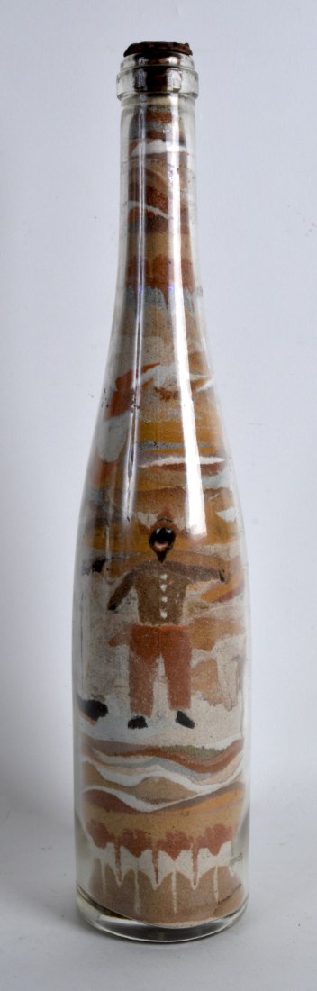 AN UNUSUAL AMERICAN FOLK ART SAND BOTTLE depicting a: AN UNUSUAL AMERICAN FOLK ART SAND BOTTLE depicting a male before a steamer, under an armorial. 1ft 1.5ins high.