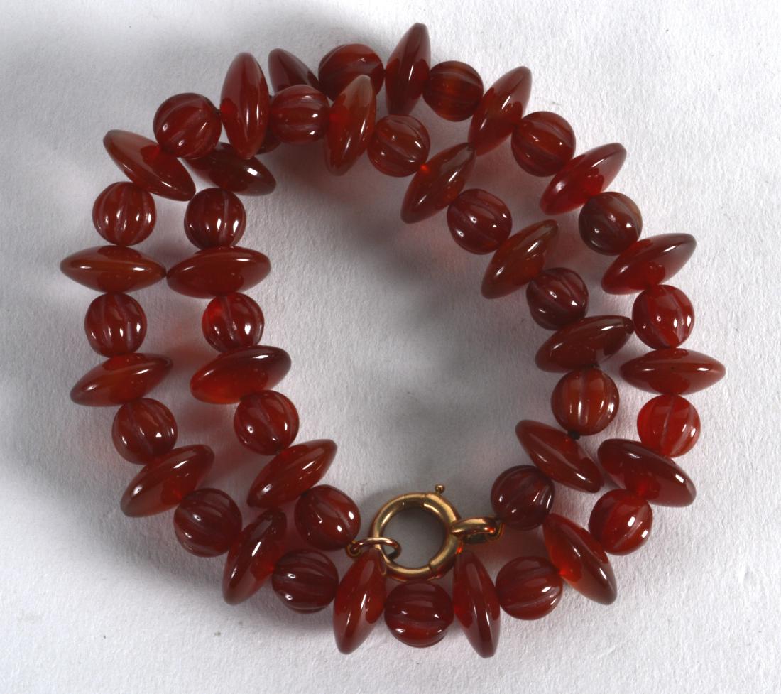 AN EARLY 20TH CENTURY 16INCH CARNELIAN NECKLACE.: AN EARLY 20TH CENTURY 16INCH CARNELIAN NECKLACE.