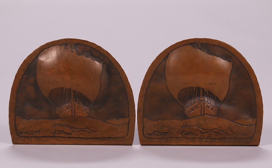 Harry Dixon Hammered Copper Acid-Etched Ship Bookends: Harry St John Dixon hammered copper acid-etched galleon ship bookends c1921-1925. Excellent original patina. Signed with incised mark (H Dixon San Francisco). 5.75″h x 6.25″w. We box and s