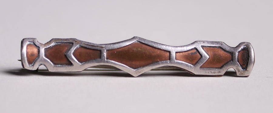 Heintz Sterling-on-bronze Pin: Heintz sterling silver on bronze brooch. Unsigned. Polished. 1.75"w x 0.25"h Spend $5000 or more at this auction and all of your SHIPPING IS FREE within the lower 48 states.SHIPPING<