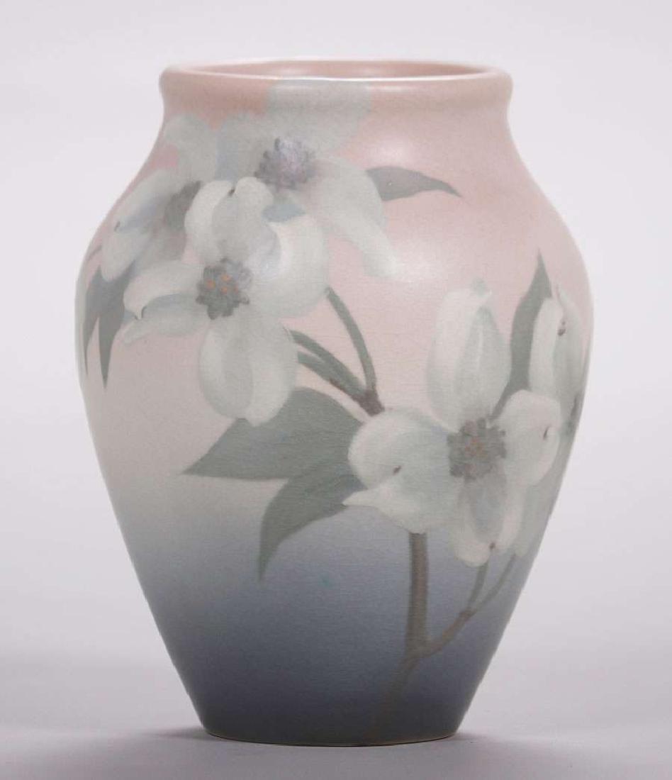 Rookwood Floral Vellum Vase by Sara Sax, dated 1904: Rookwood floral vellum vase decorated by Sara Sax dated 1904. Perfect condition. 7.25"h x 5"d Spend $5000 or more at this auction and all of your SHIPPING IS FREE within the lower 48 states.SHIPPING<