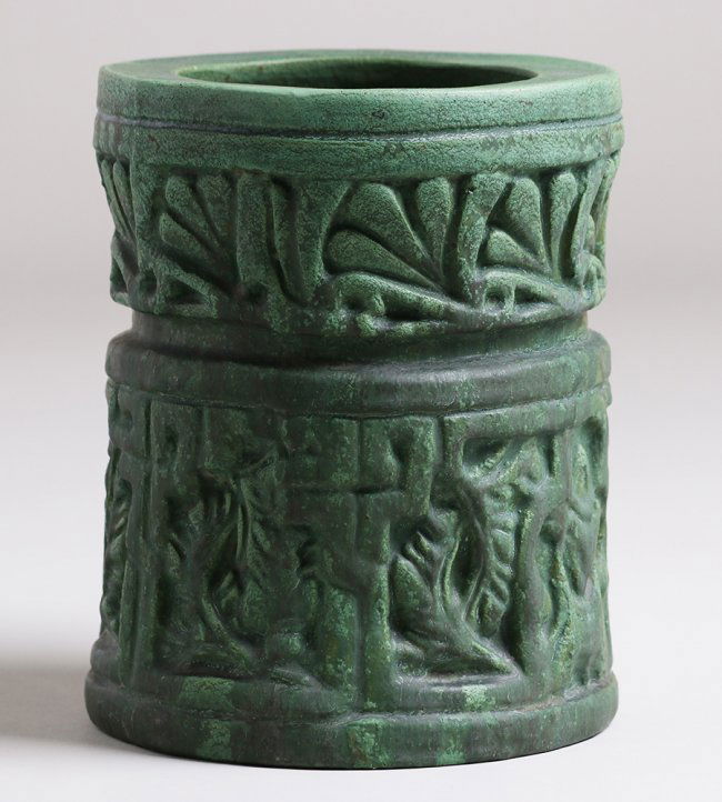 Wheatley Pottery Matte Green Cylinder Vase: Wheatley Pottery matte green cylindrical vase with deep embossed design. Unsigned but marked with Wheatley number on base. Perfect condition. 9.25"h x 7.25"d. Spend $5000 or more at this auction and