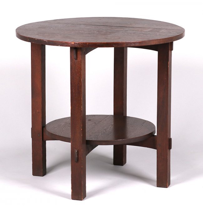 L&JG Stickley Onondaga Shops Lamp Table c1902-1904: Early L&JG Stickley Onondaga Shops lamp table. Unsigned. Original finish with stains to top. 30"d x 28"h. Spend $5000 or more at this auction and all of your SHIPPING IS FREE within the lower 48 state