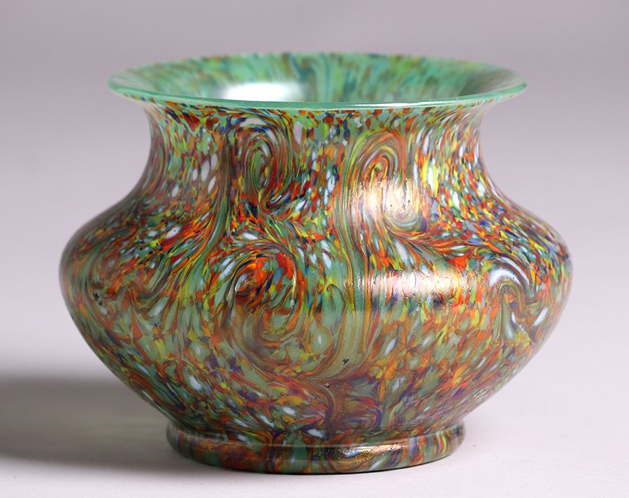 Loetz Art Glass Vase c1900: Loetz Art Glass Vase with beautiful iridescent glass c1900. Signed with "Czecho Slavakia" mark. Perfect condition. 5"h x 6.5"d. Spend $5000 or more at this auction and all of your SHIPPING IS FREE wi