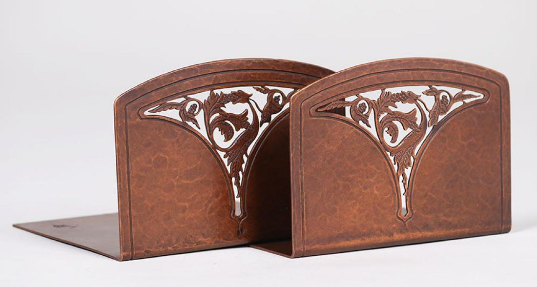 John Joseph Brennan - Flint, MI - Hammered Copper: John Joseph Brennan - Flint, MI - hammered copper cutout bookends. Signed. Excellent new patina. 5.75"w x 4"h. Spend $5000 or more at this auction and all of your SHIPPING IS FREE within the lower 48 
