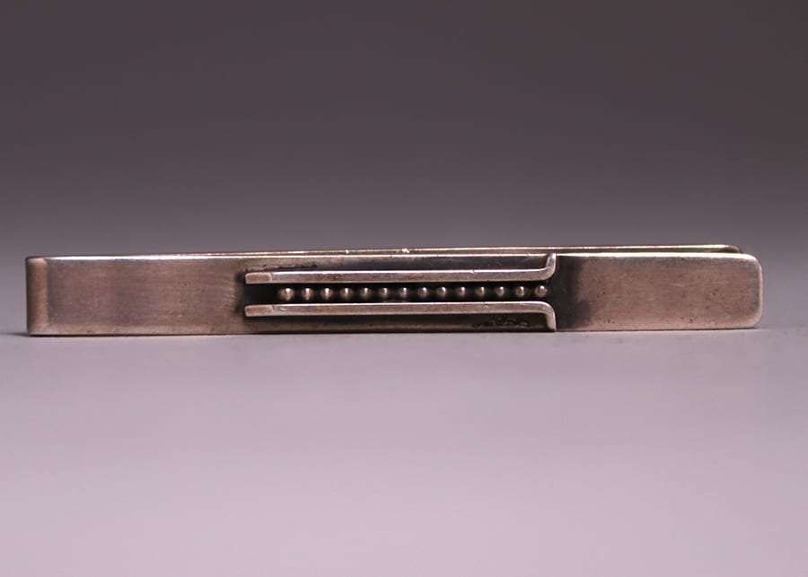 John Lauritzen - Denmark - Sterling Tie Clip c1920s: John Lauritzen - Denmark - sterling silver tie clip c1920s. Signed. 2 3/8". Spend $5000 or more at this auction and all of your SHIPPING IS FREE within the lower 48 states.SHIPPING