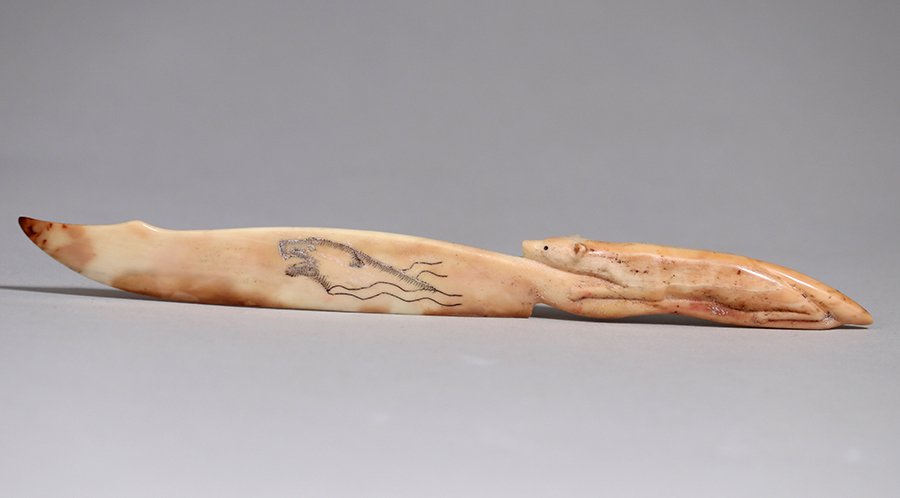 Eskimo Carved Fox & Seal Scrimshaw Letter Opener c1920: Eskimo Carved Fox & Seal Scrimshaw Letter Opener c1920. Unsigned. Excellent condition. 7" long. Spend $5000 or more at this auction and all of your SHIPPING IS FREE within the lower 48 states. SH