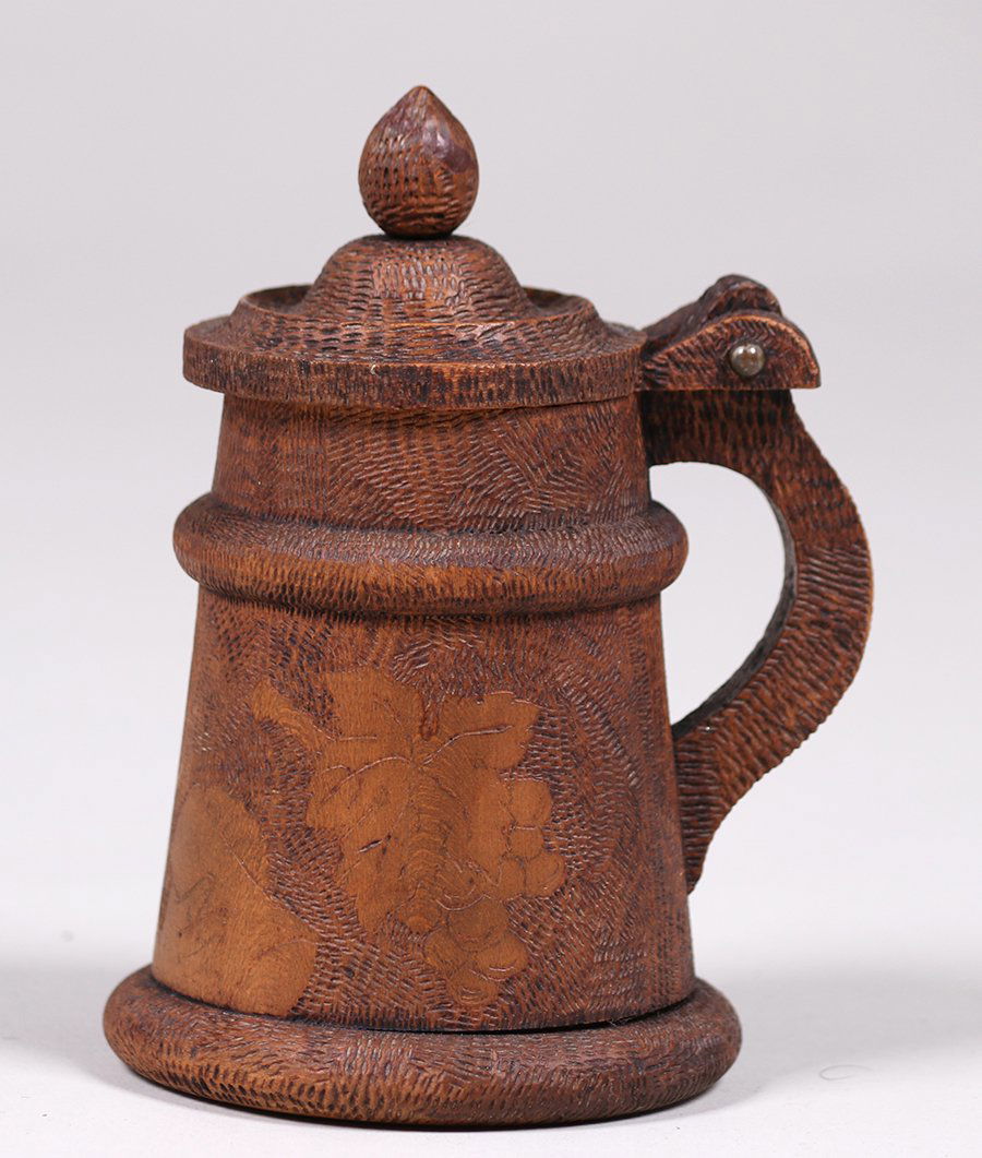 Tramp Art Pyrography Mug c1920s: Tramp Art pyrography mug c1920s. Unsigned. Excellent condition. 6.25"h x 4"d. Spend $5000 or more at this auction and all of your SHIPPING IS FREE within the lower 48 states.SHIPPING