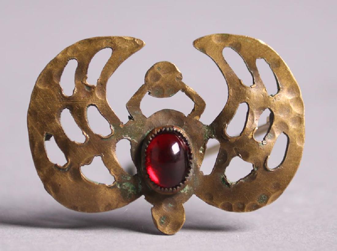 Frost Cutout Brass Scarab Brooch c1905: Frost Workshops - Dayton, OH hammered brass cutout scarab brooch c1905. 1 5/8"w x 1"h Spend $5000 or more at this auction and all of your SHIPPING IS FREE within the lower 48 states. SHIPPING</