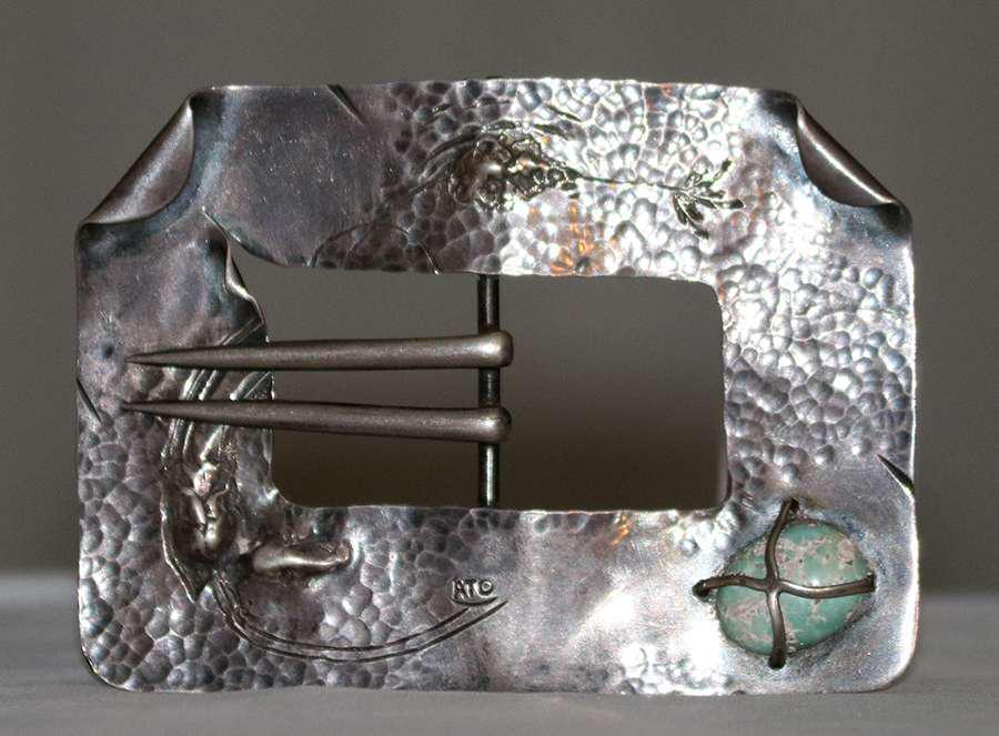 Apollo Studios Sterling Silver Belt Buckle - Brooch: Apollo Studios - New York sterling silver belt buckle - brooch with repousse flowers c1915. Signed "ATO" on front and "Apollo Studios Sterling" on back. 4.25"w x 3.25"h Spend $5000 or more at this auc